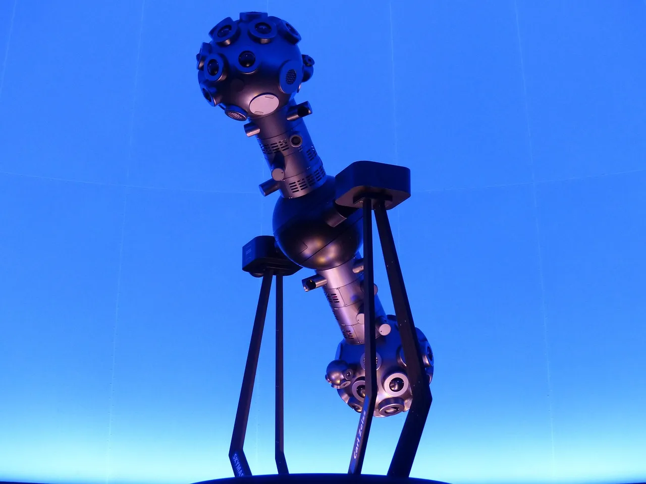 star projector, planetarium, projector, machine, futuristic, blue, bright, fluorescent, robot, like a robot, planetarium, planetarium, planetarium, planetarium, projector, futuristic, robot, robot, robot, robot, robot. Case study: a fictional planetary data announcement