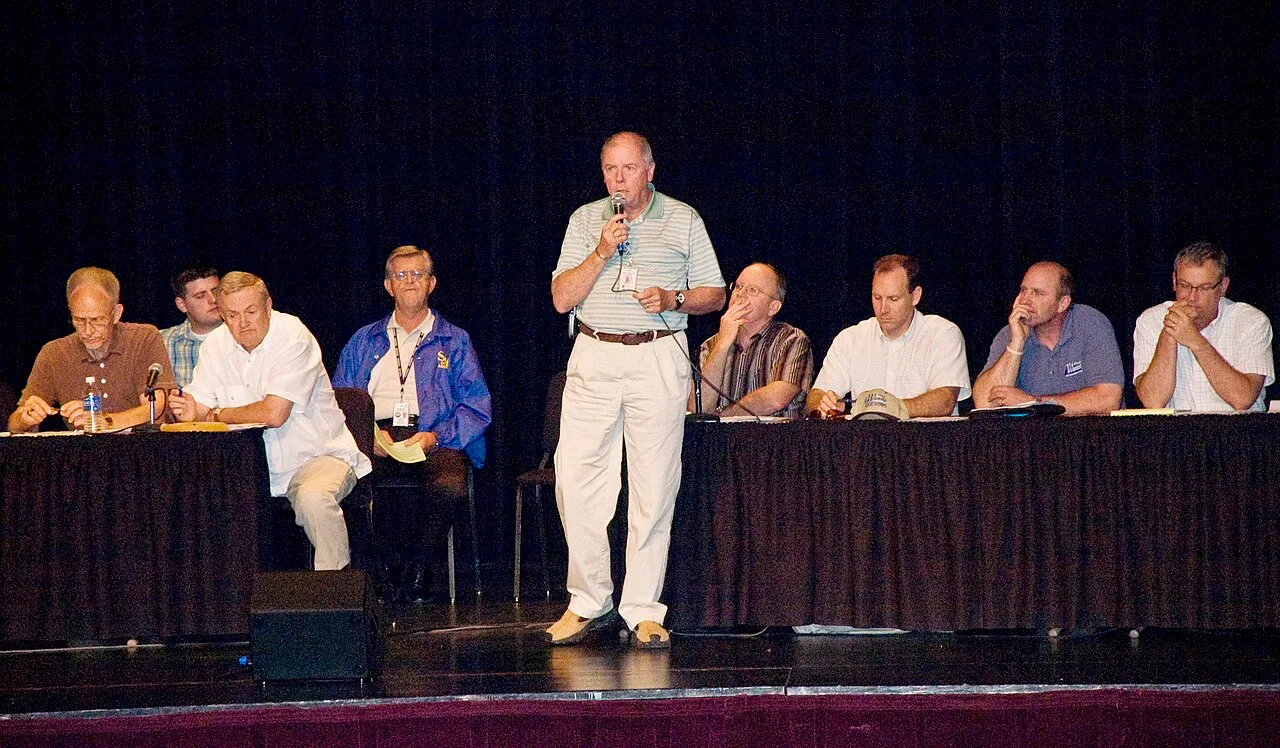 Officials speaking to residents at a FEMA town hall meeting in Iowa