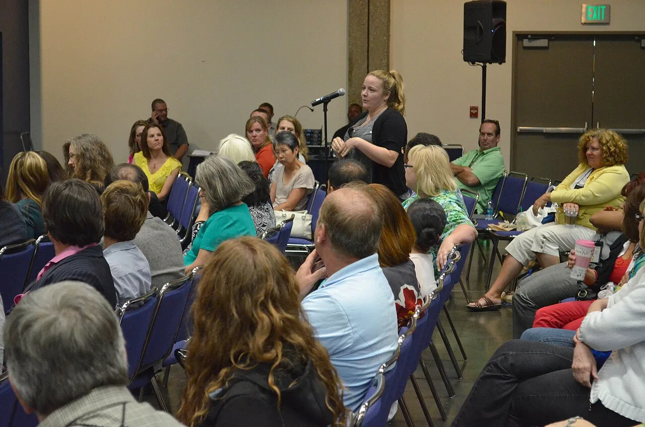 A participant asking a question during a U.S. Army Corps of Engineers town hall